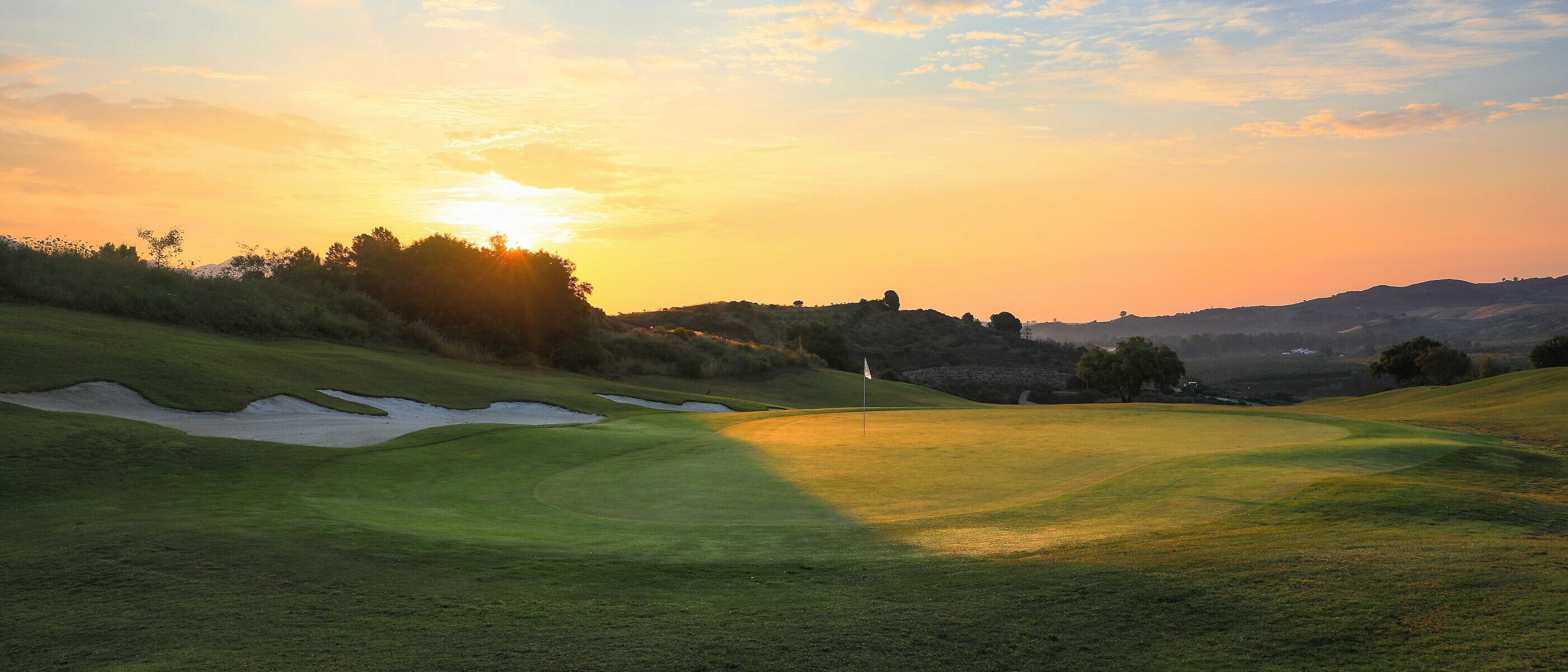 La Cala Campo Europa Sunset Over Green